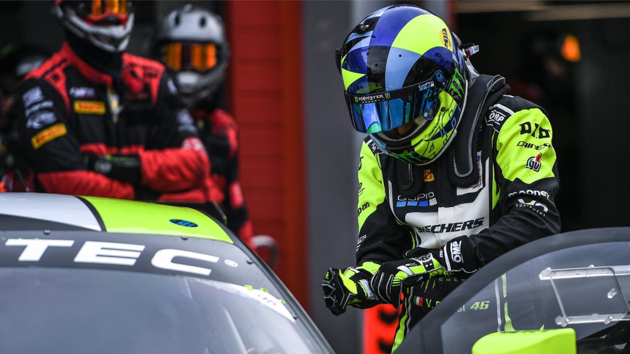 Nine-time MotoGP world champion, Valentino Rossi prepares to get into his Audi R8 Lms to compete in the Fanatec GT World Challenge Europe 2022 on April 03, 2022 at the Imola race track, Italy. Rossi has signed with Belgian team Wrt and will race an Audi R8 Lms, bearing the unmistakable number 46 in the Fanatec Challenge Europe championship.
AFP/Andrea SCIARRA