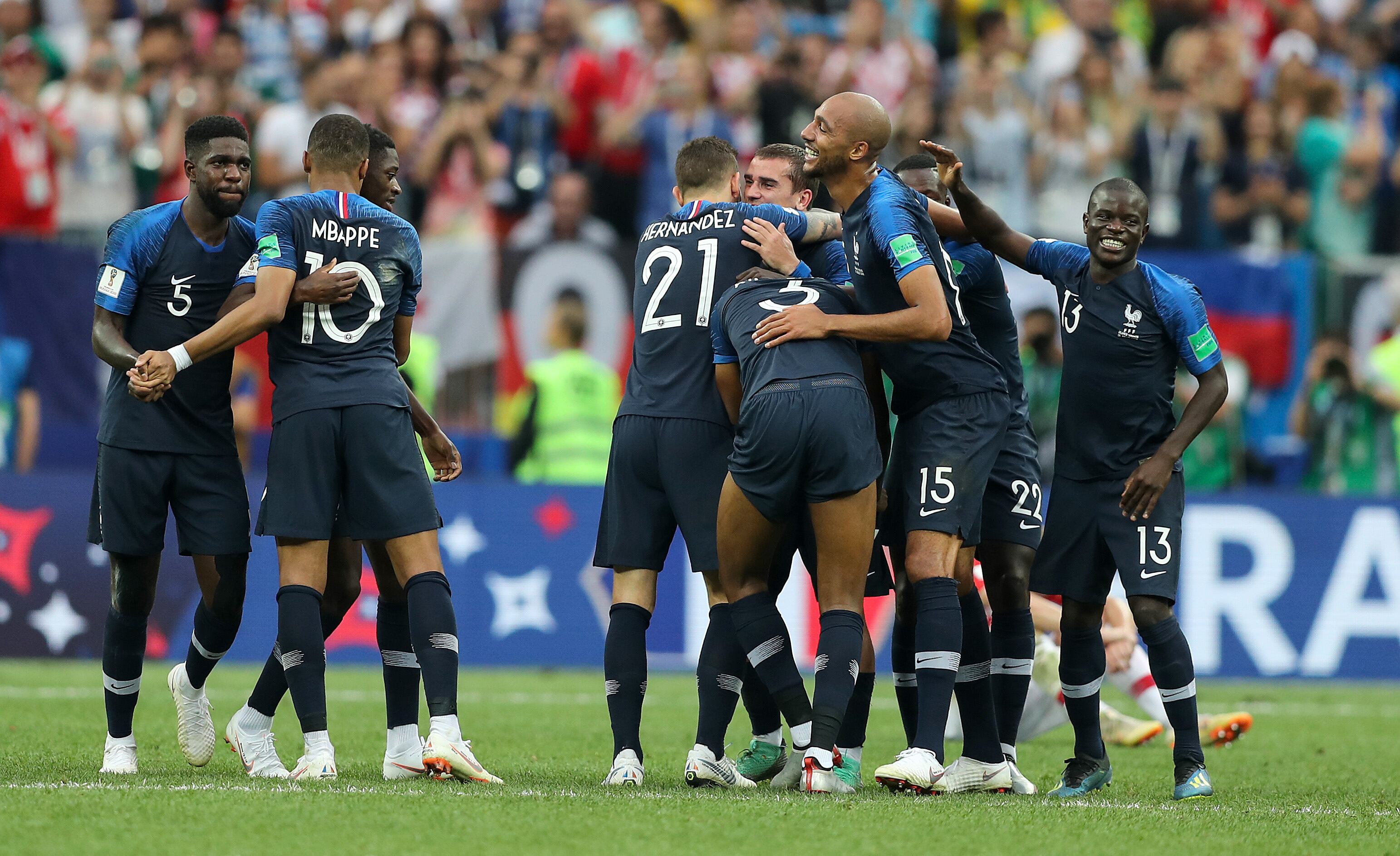 MOSCOW, RUSSIA - JULY 15: Samuel Umtiti of France Kyliane Mbappe of France Antoine Griezmann of France Steven Nzonzi of France Ngolo Kante of France celebrate following their sides victory the 2018 FIFA World Cup Russia Final between France and Croatia at Luzhniki Stadium on July 15, 2018 in Moscow, Russia. (Photo by Stefan Matzke - sampics/Corbis via Getty Images)