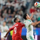 Algeria's Aissa Mandi (2) battles for the ball with Jordan's Ali Olwan (9) during the World Cup Group J soccer match between Jordan and Algeria in Santa Clara, Calif., near San Francisco, Monday, June 22, 2026. (AP Photo/Eugene Hoshiko)