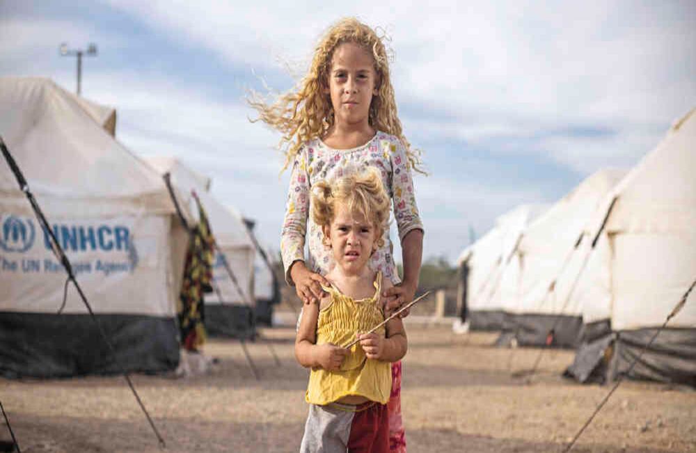 Paz en medio de la incertidumbre: El Centro de Atención Integral al Migrante (CAI) de Maicao, un albergue de Acnur, ha acogido a más de 1.600 inmigrantes venezolanos desde el 8 de marzo y más de 4.000 están en lista para ingresar. Para los más chicos es un oasis en medio del desierto.   Foto: Diana Rey Melo / SEMANA