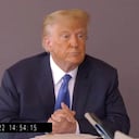 In this image taken from video released by Kaplan Hecker & Fink, former President Donald Trump pauses during his Oct. 19, 2022, deposition for his trial against writer E. Jean Carroll. The video recording of Trump being questioned about the rape allegations against him was made public for the first time Friday, May 5, 2023, providing a glimpse of the Republican's emphatic, often colorful denials. (Kaplan Hecker & Fink via AP)