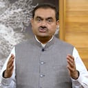 This grab from video released by Adani Enterprises Ltd. on Thursday, Feb.2, 2023 shows Indian billionaire Gautam Adani addressing investors from an unknown location. Losses for the troubled Adani Group, India's second-largest conglomerate, deepened on Friday as shares in its flagship company tumbled another 25%, extending over a week of declines that have wiped out tens of billions of dollars in market value. (Adani Enterprises Ltd. via AP)