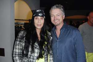 - JULY 2: Cher and ? attend Elijah Blue "Stuff of Legends" presented by Kantor Gallery and Madison Gallery at Malibu on July 2, 2010. (Photo by DAVID CROTTY/Patrick McMullan via Getty Images)