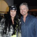 - JULY 2: Cher and ? attend Elijah Blue "Stuff of Legends" presented by Kantor Gallery and Madison Gallery at Malibu on July 2, 2010. (Photo by DAVID CROTTY/Patrick McMullan via Getty Images)
