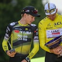 PARIS, FRANCE - JULY 27: (L-R) Second classified, Jonas Vingegaard of Denmark and Team Visma | Lease a Bike and final overall winner, Tadej Pogacar of Slovenia and UAE Team Emirates - XRG - Yellow leader jersey look on at podium during Tour de France Stage 21, last and final stage of the 112th Tour de France 2025, a 132.3 km stage from Mantes-La-Ville to Paris Champs-Elysees on July 27, 2025 in Paris, France. (Photo by Sara Cavallini/Getty Images)