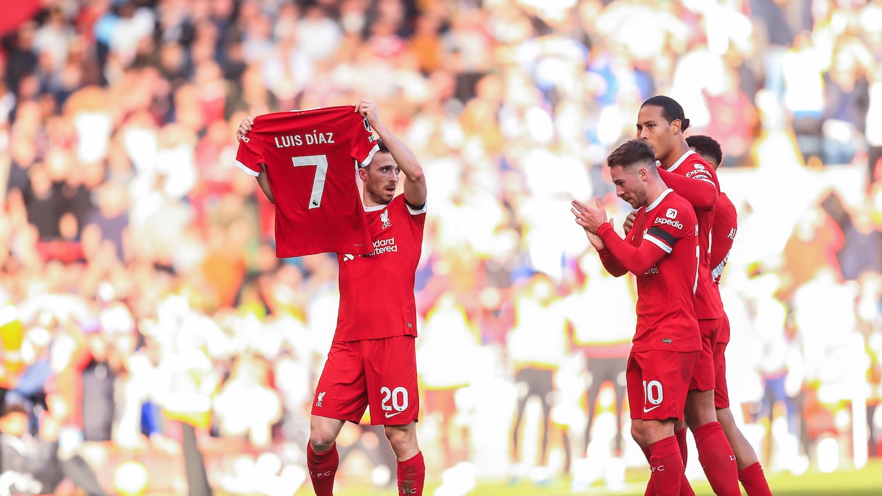 LIVERPOOL, ENGLAND - OCTOBER 29: Diogo Jota of Liverpool holds the shirt of teammate Luis Diaz after scoring their first goal to make the score 1-0 during the Premier League match between Liverpool FC and Nottingham Forest at Anfield on October 29, 2023 in Liverpool, England. (Photo by Daniel Chesterton/Offside/Offside via Getty Images)