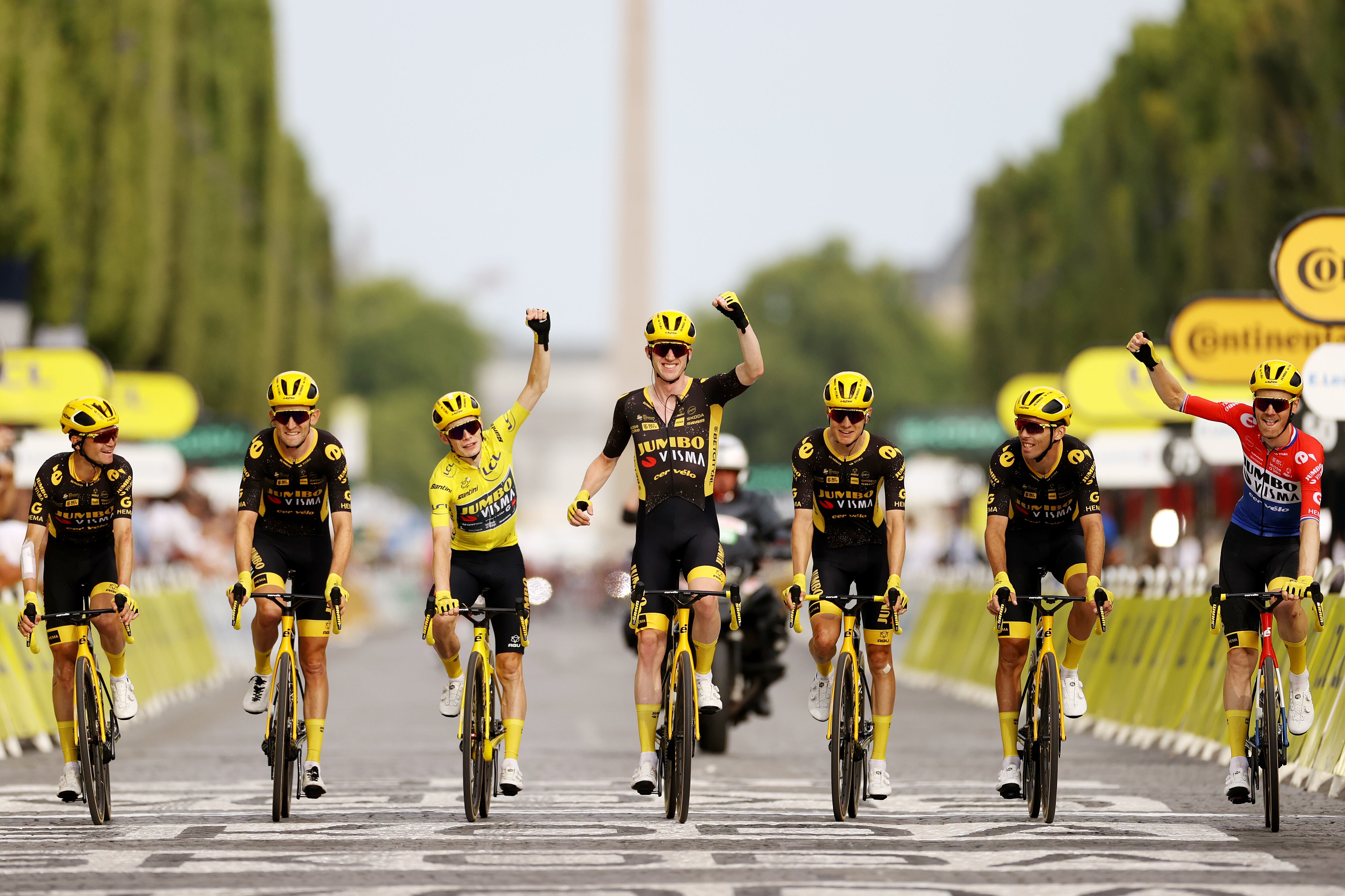 PARIS, FRANCE - JULY 23: Jonas Vingegaard of Denmark - Yellow Leader Jersey, Tiesj Benoot of Belgium, Wilco Kelderman of The Netherlands, Sepp Kuss of The United States, Christophe Laporte of France, Dylan Van Baarle of The Netherlands, Nathan Van Hooydonck of Belgium and Team Jumbo-Visma celebrate after the stage twenty-one of the 110th Tour de France 2023 a 11 5.1km stage from Saint-Quentin-en-Yvelines to Paris / #UCIWT / on July 23, 2023 in Paris, France. (Photo by Michael Steele/Getty Images)