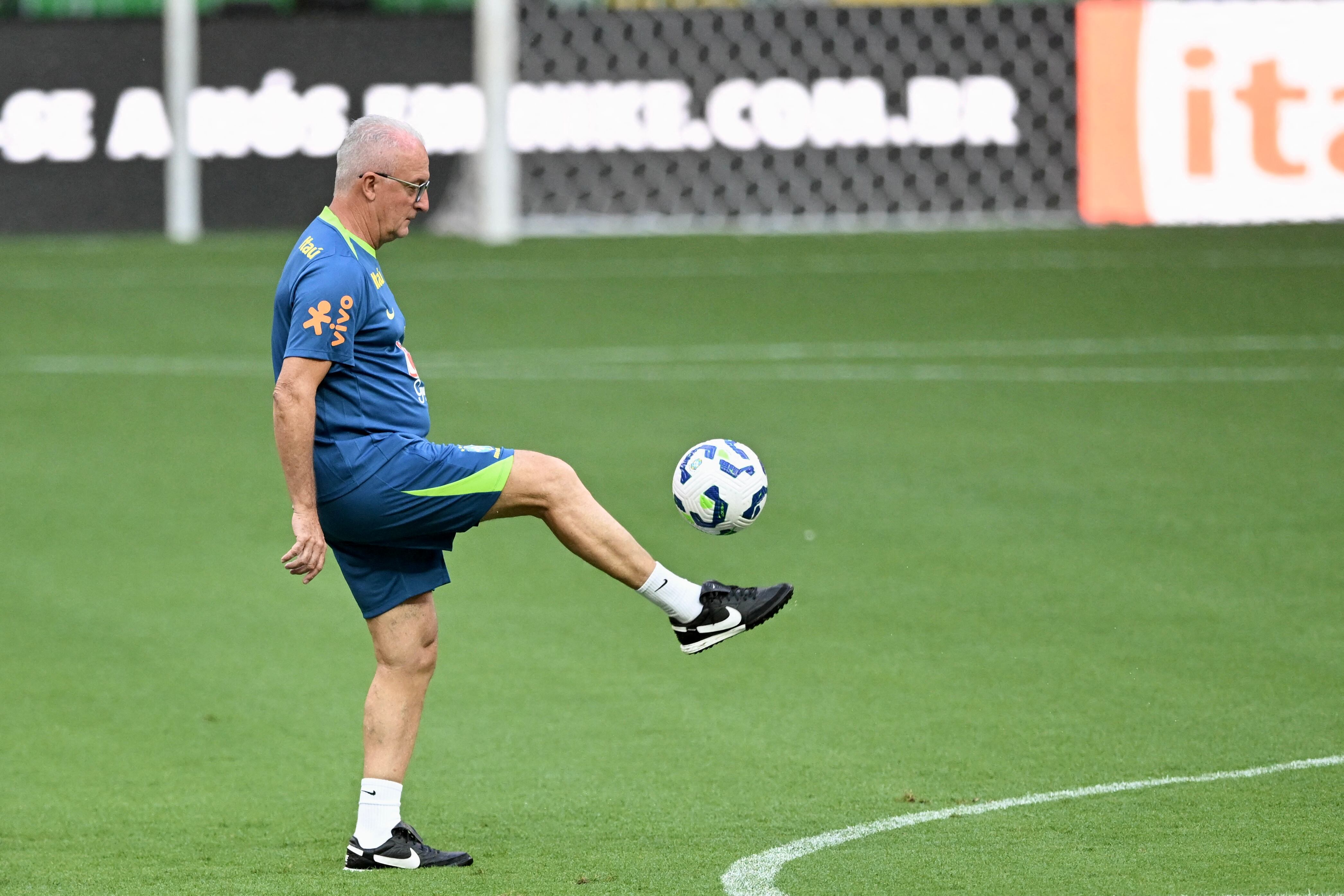 Brazil's head coach Dorival Junior controls the ball during a training session in Brasilia, on March 19, 2025, on the eve of their FIFA World Cup 2026 qualifiers football match against Colombia. (Photo by EVARISTO SA / AFP)
