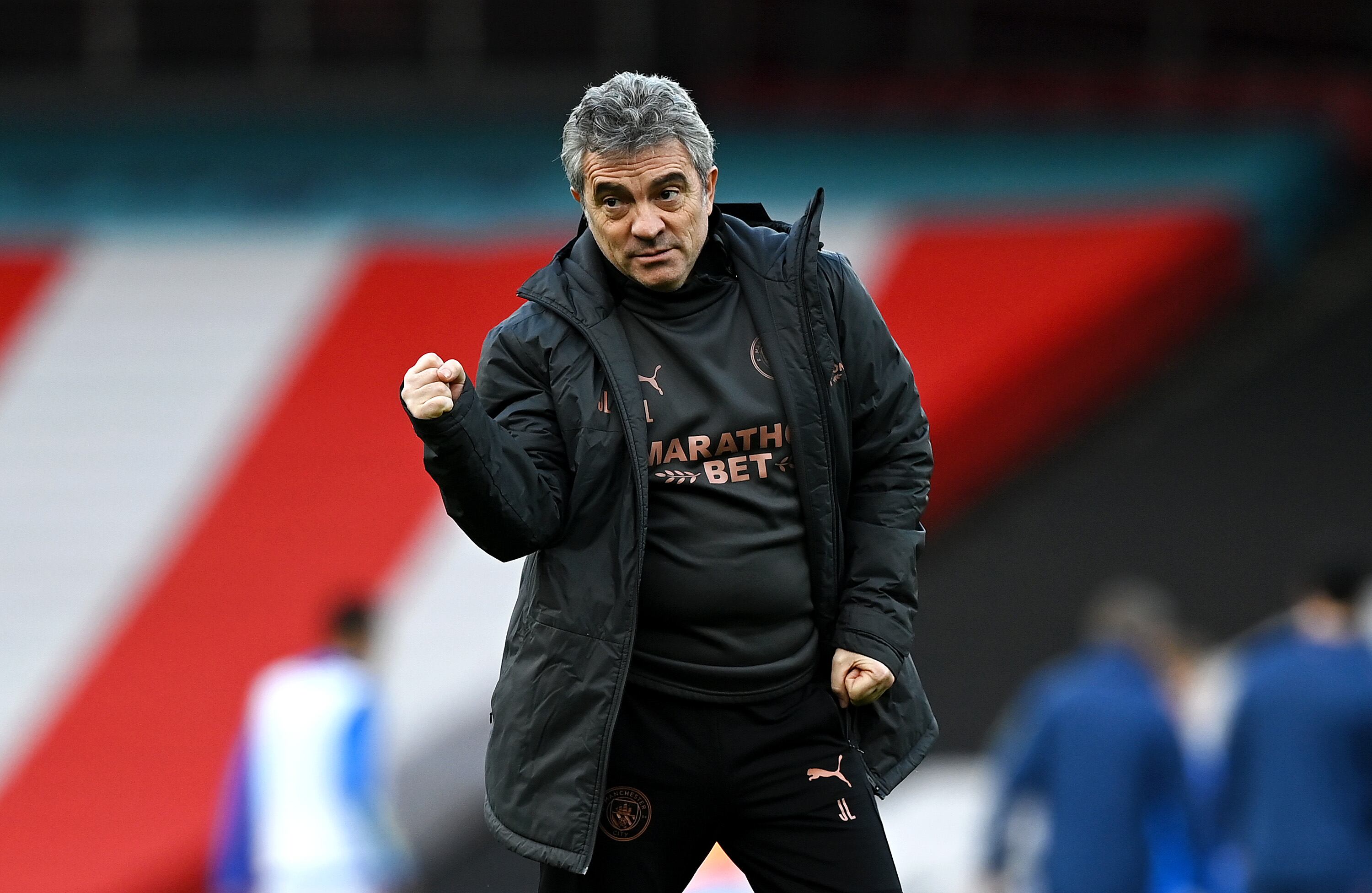 Arsenal v Manchester City - Premier League
LONDON, ENGLAND - FEBRUARY 21: Juan Manuel Lillo, Assistant Coach of Manchester City reacts prior to the Premier League match between Arsenal and Manchester City at Emirates Stadium on February 21, 2021 in London, England. Sporting stadiums around the UK remain under strict restrictions due to the Coronavirus Pandemic as Government social distancing laws prohibit fans inside venues resulting in games being played behind closed doors. (Photo by Shaun Botterill/Getty Images)
