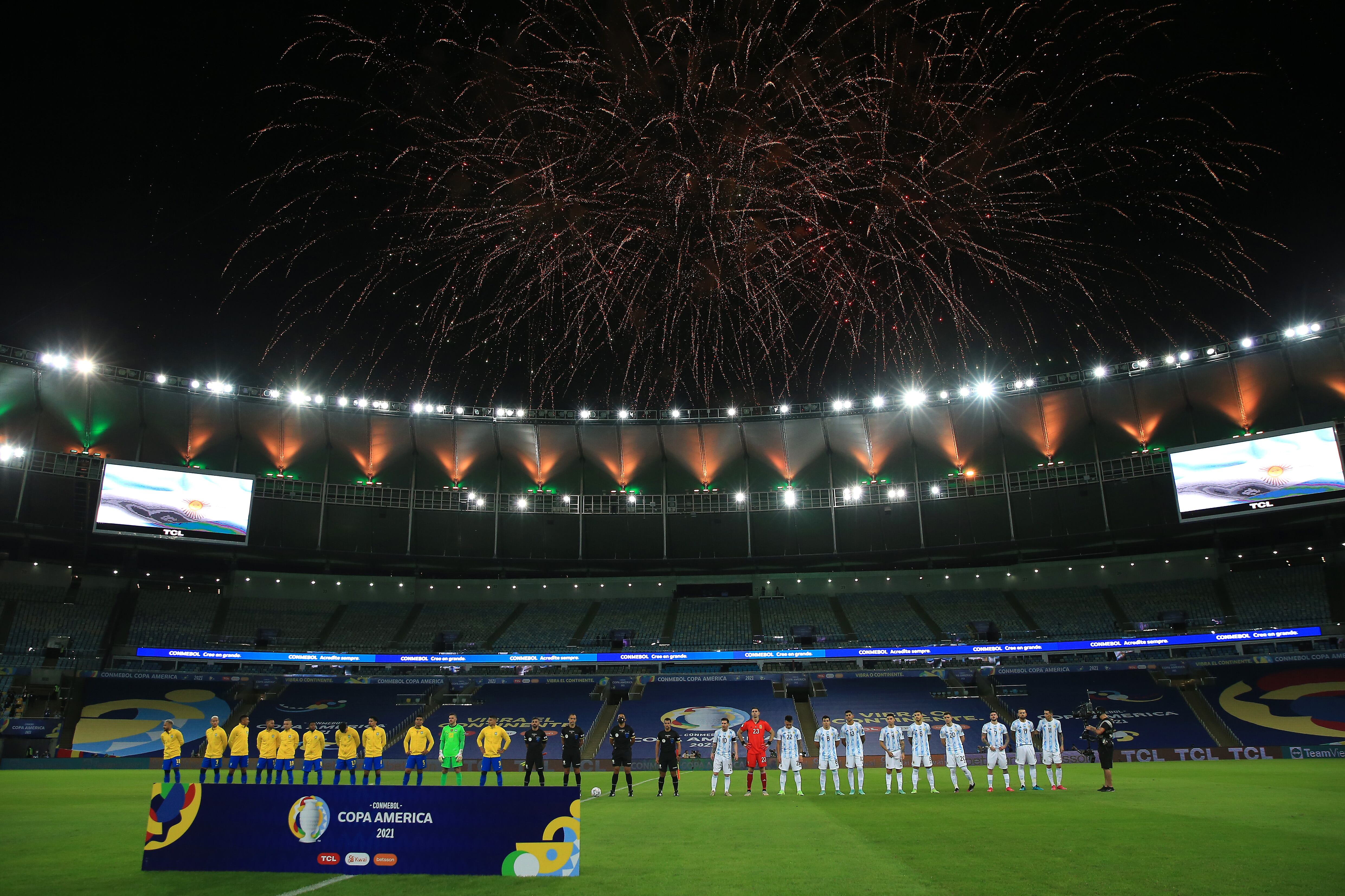 RIO DE JANEIRO, BRAZIL - JULY 10: Players of Argentina and Brazil stand for the national anthems prior to the final of Copa America Brazil 2021 between Brazil and Argentina at Maracana Stadium on July 10, 2021 in Rio de Janeiro, Brazil. (Photo by Buda Mendes/Getty Images)