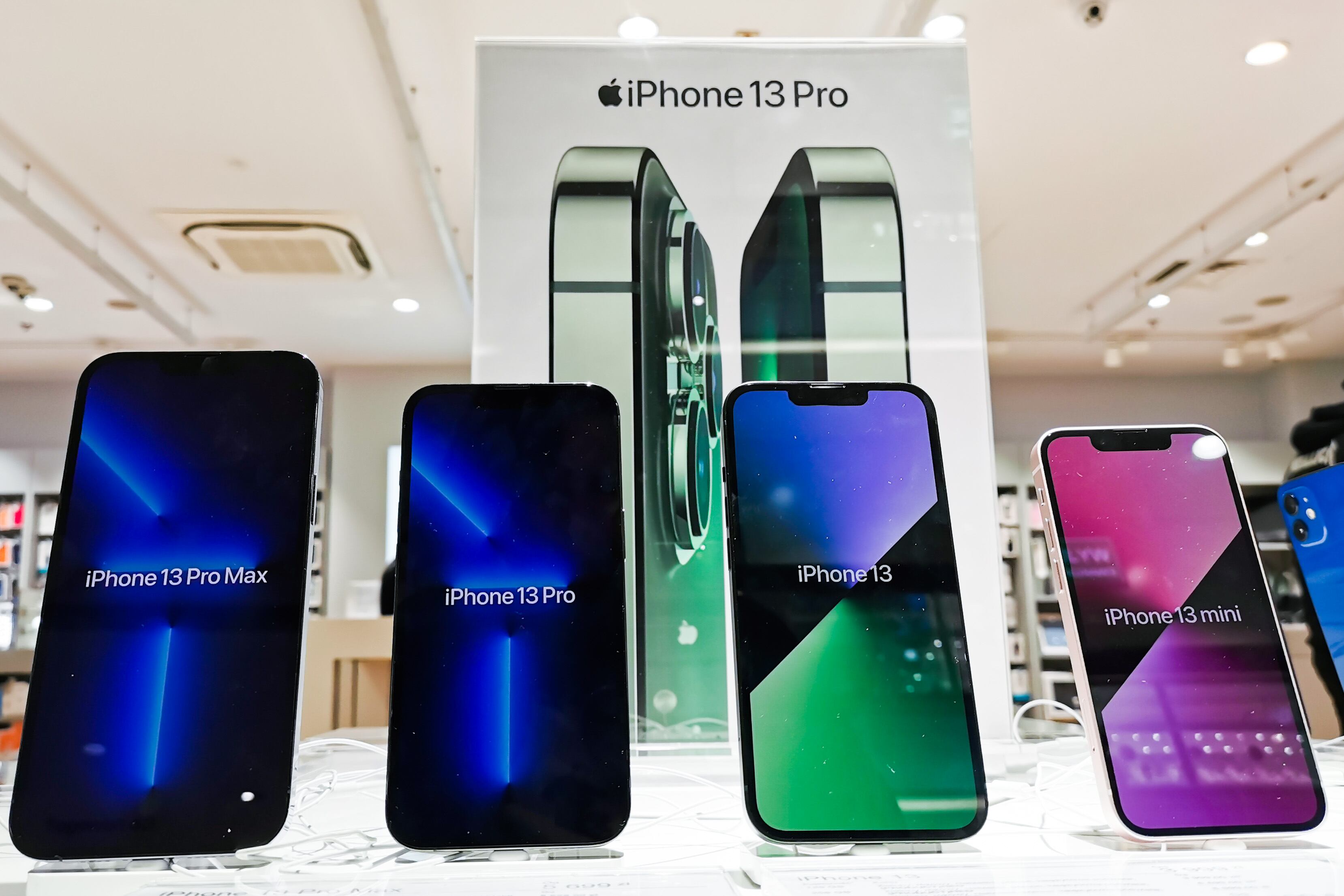 iIhone 13 Pro Max, iPhone 13 Pro, iPhone 13 and iPhone 13 mini are seen inside ISpot store in Galeria Krakowska shopping mall in Krakow, Poland on May 30, 2022. (Photo by Beata Zawrzel/NurPhoto via Getty Images)