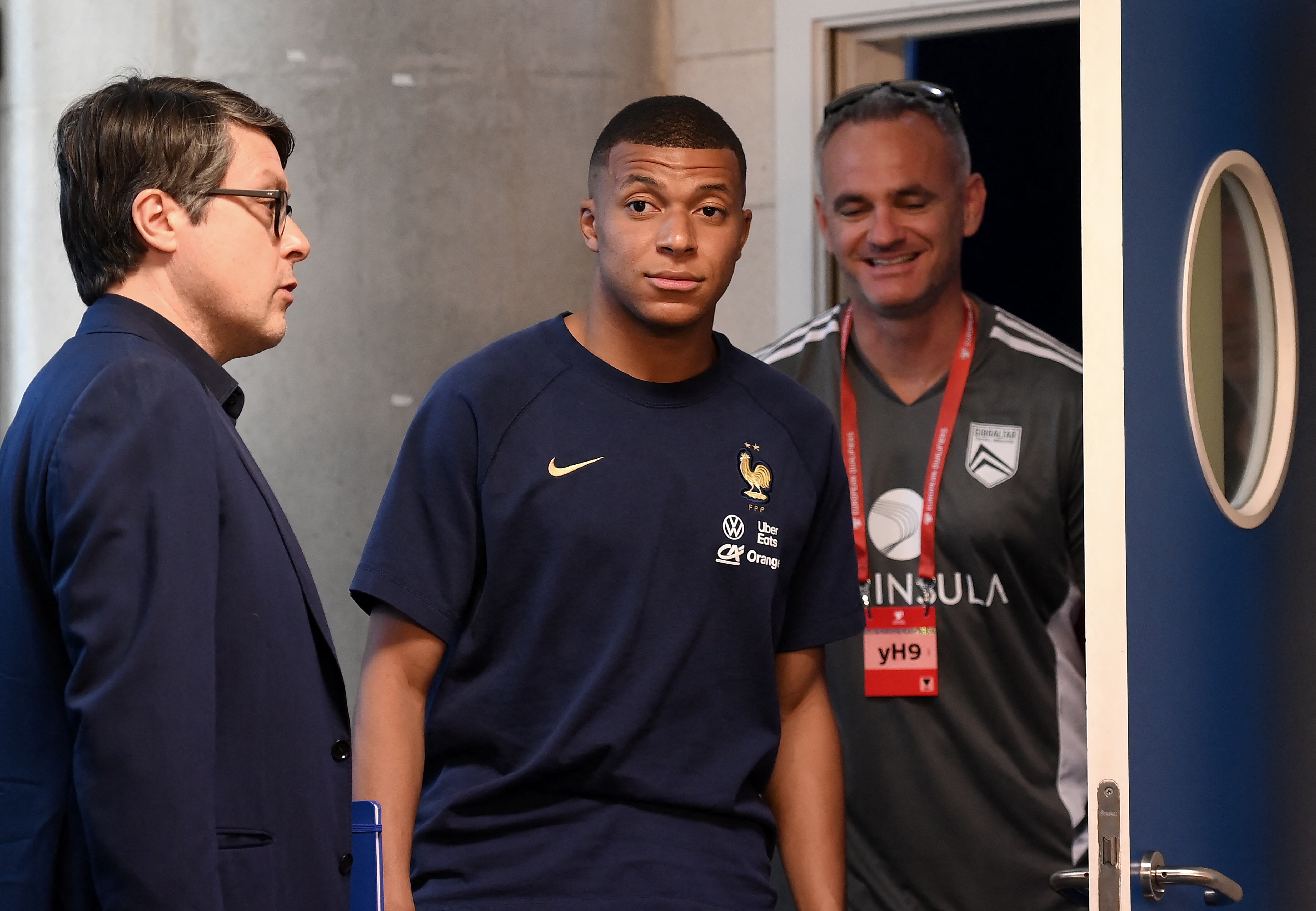 France's forward Kylian Mbappe (C) arrives for a press conference at the Algarve stadium, in Faro on June 15, 2023, on the eve of their UEFA Euro 2024 group B qualification football match against Gibraltar. (Photo by FRANCK FIFE / AFP)