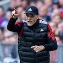 Munich's head coach Thomas Tuchel points during the German Bundesliga soccer match between FC Bayern Munich and FC Schalke 04 in Munich, Germany, Saturday, May 13, 2023. (Tom Weller/dpa via AP)