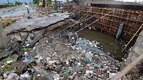 Destrozos materiales y una persona desaparecida en Kingston, Jamaica. Fotografía vía: Ricardo Makyn / AFP