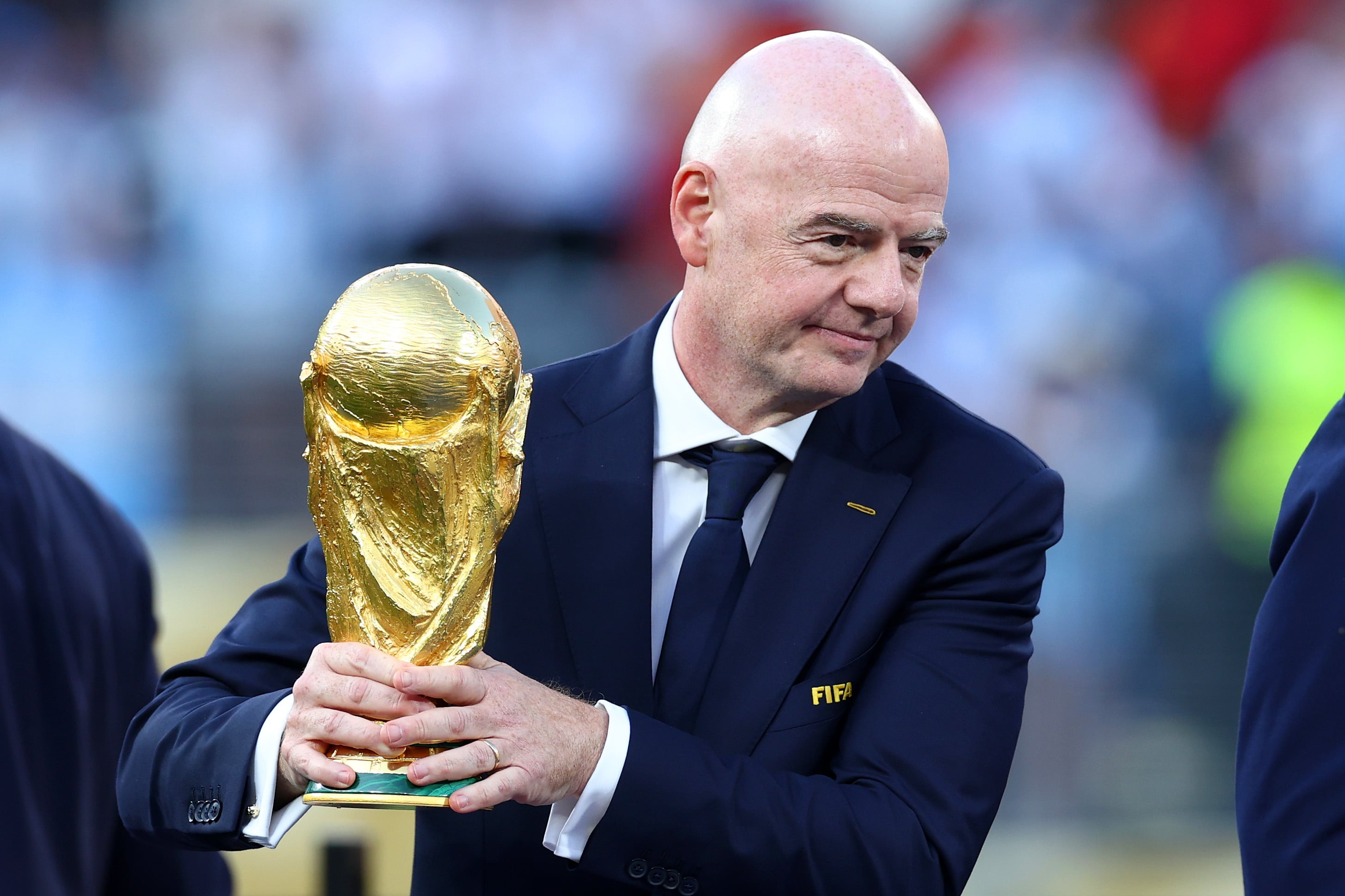 EAST RUTHERFORD, NEW JERSEY - JULY 19: FIFA President Gianni Infantino holds the trophy at full-time following the FIFA World Cup 2026 Final match between Spain and Argentina at New York New Jersey Stadium on July 19, 2026 in East Rutherford, New Jersey. (Photo by Chris Brunskill/Fantasista/Getty Images)