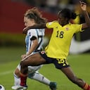 Colombia's Linda Caicedo, right, and Argentina's Estefania Banini battle for the ball during a women's Copa America semi final soccer match in Bucaramanga, Colombia , Monday, July 25, 2022. (AP Photo/Dolores Ochoa)