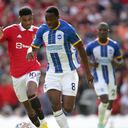Manchester United's Marcus Rashford (left) and Brighton and Hove Albion's Enock Mwepu during the Premier League match at Old Trafford, Manchester. Picture date: Sunday August 7, 2022. (Photo by Ian Hodgson/PA Images via Getty Images)
