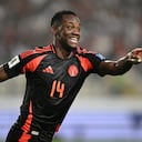 Colombia's forward Jhon Dur�n celebrates the goal of his teammate forward Luis Diaz (out of frame) during the 2026 FIFA World Cup South American qualifiers football match between Peru and Colombia, at the Monumental stadium in Lima, on September 6, 2024. (Photo by ERNESTO BENAVIDES / AFP)