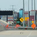 A container ship as it rests against wreckage of the Francis Scott Key Bridge on Tuesday, March 26, 2024, as seen from Dundalk, Md. The ship rammed into the major bridge in Baltimore early Tuesday, causing it to collapse in a matter of seconds and creating a terrifying scene as several vehicles plunged into the chilly river below. (AP Photo/Matt Rourke)