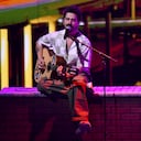 ARCHIVO - Camilo canta en los Premios Lo Nuestro el 14 de febrero de 2021 en Miami. Camilo encabezó el martes la lista de nominados al Latin Grammy el martes 28 de septiembre de 2021, con 10 menciones que incluyen canción del año, grabación del año y álbum del año, por "Mis Manos". La ceremonia de los Latin Grammy, en su 22da edición, será el 18 de noviembre. (AP Foto/Jim Rassol, Archivo)