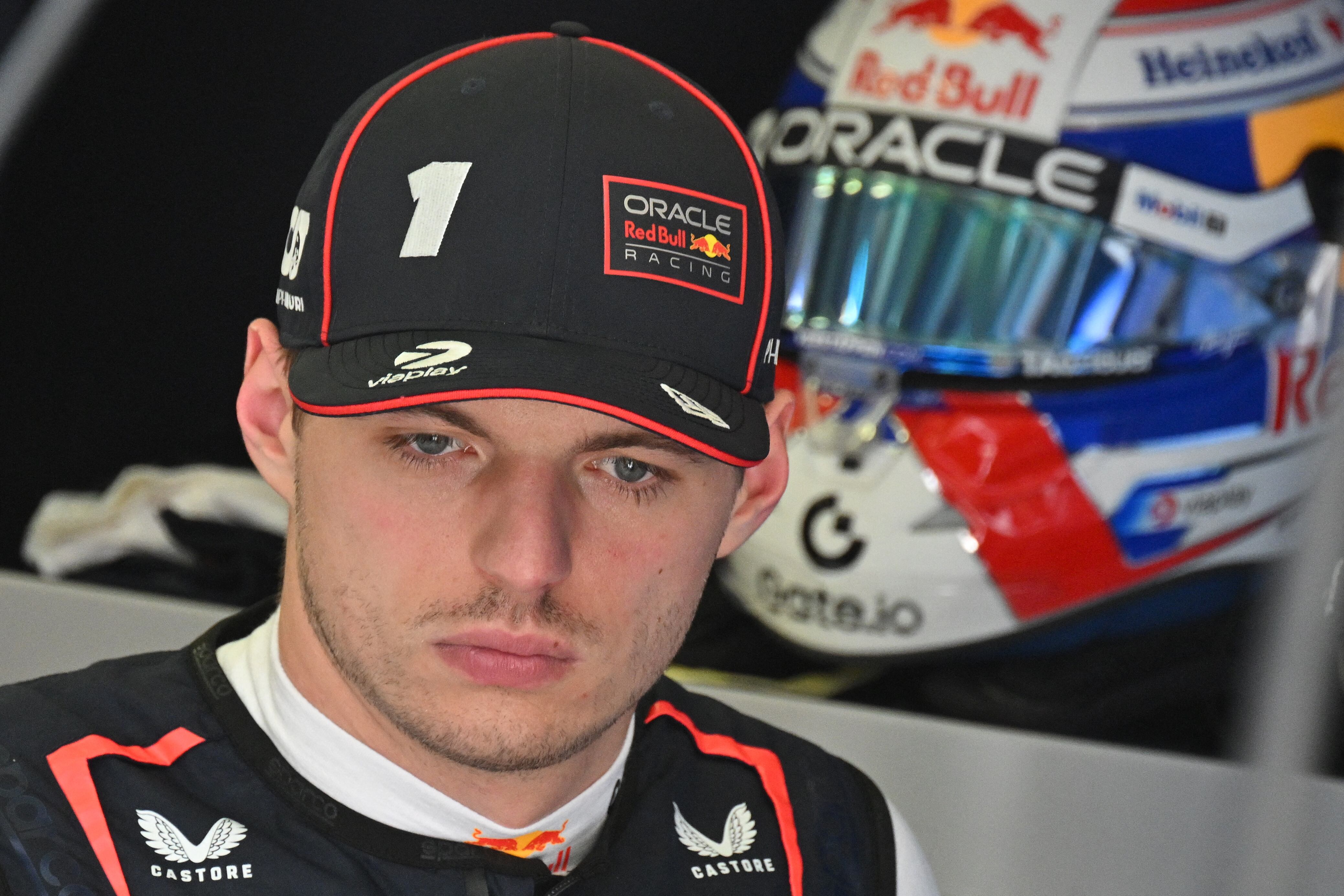 Red Bull Racing's Dutch driver Max Verstappen stands in the pit during the third practice session ahead of the Bahrain Formula One Grand Prix at the Bahrain International Circuit in Sakhir on April 12, 2025. (Photo by Andrej ISAKOVIC / AFP)