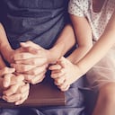 children praying with their parent at home, family pray, Having faith and hope.