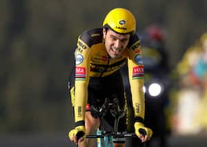 FILE- In this Saturday Sept. 19, 2020, file photo Netherland's Tom Dumoulin crosses the finish line of stage 20 of the Tour de France cycling race, an individual time trial over 36.2 kilometers (22.5 miles), from Lure to La Planche des Belles Filles, France. Dumoulin announced Saturday Jan. 23, 2020, that he is taking a break from racing, admitting that he is struggling to deal with the pressure of the sport. (AP Photo/Christophe Ena, File)