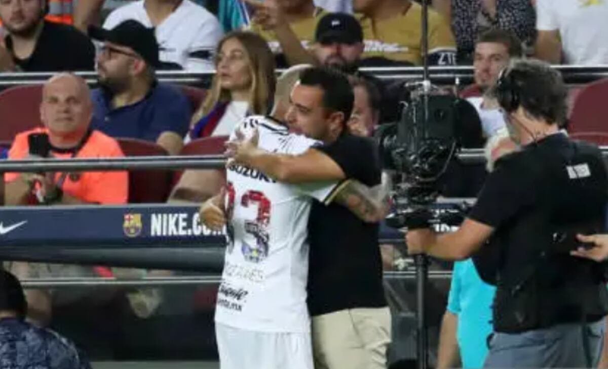 Xavi Hernández y Dani Alves