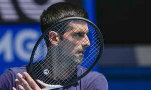 Defending champion Serbia's Novak Djokovic practices ahead of the Australian Open tennis championship in Melbourne, Australia, Jan. 12, 2022. Weary after two years of some of the harshest COVID-19 border restrictions in the world, many Australians wanted Djokovic kicked out of their country for traveling to the tennis tournament without being vaccinated. But the backdrop to the government's tough line on the defending Australian Open champion and Prime Minister Scott Morrison’s description of the expulsion as a "decision to keep our borders strong" dates to nearly a decade ago. It also shines a light on Australia's complicated, and strongly criticized, immigration and border policies. (AP Photo/Mark Baker, File)