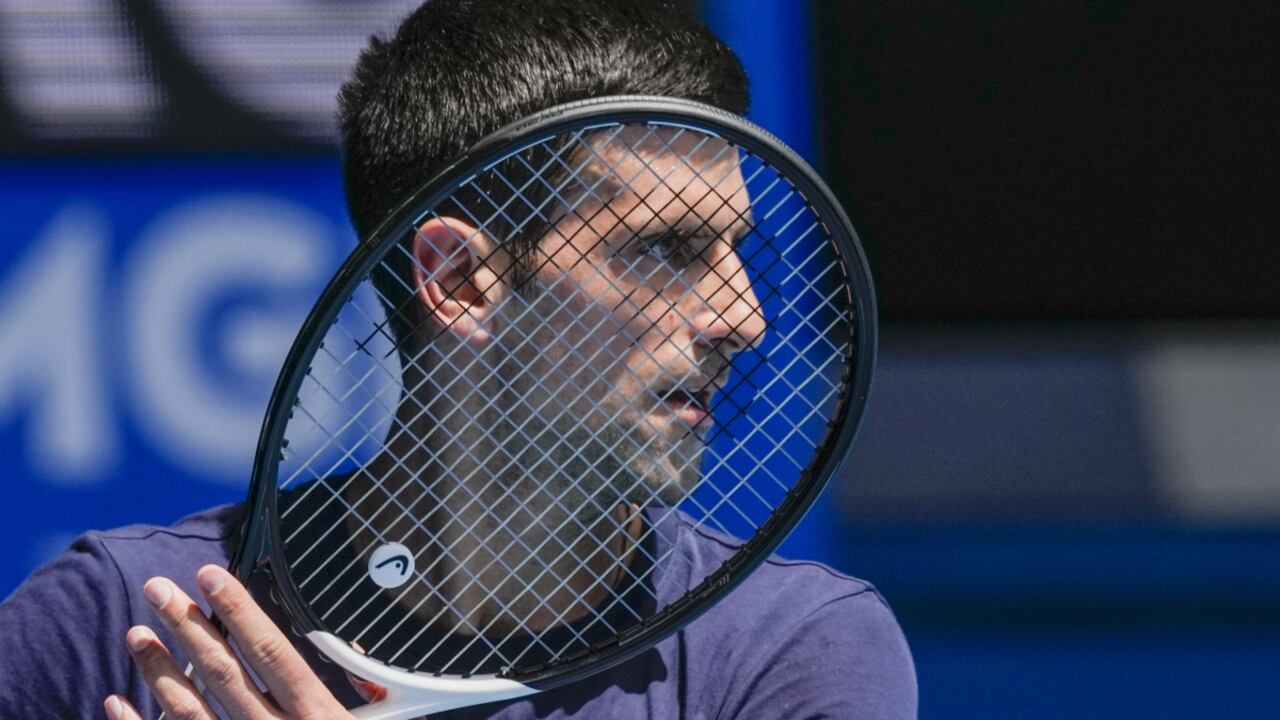 Defending champion Serbia's Novak Djokovic practices ahead of the Australian Open tennis championship in Melbourne, Australia, Jan. 12, 2022. Weary after two years of some of the harshest COVID-19 border restrictions in the world, many Australians wanted Djokovic kicked out of their country for traveling to the tennis tournament without being vaccinated. But the backdrop to the government's tough line on the defending Australian Open champion and Prime Minister Scott Morrison’s description of the expulsion as a "decision to keep our borders strong" dates to nearly a decade ago. It also shines a light on Australia's complicated, and strongly criticized, immigration and border policies. (AP/Mark Baker, File)