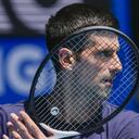 Defending champion Serbia's Novak Djokovic practices ahead of the Australian Open tennis championship in Melbourne, Australia, Jan. 12, 2022. Weary after two years of some of the harshest COVID-19 border restrictions in the world, many Australians wanted Djokovic kicked out of their country for traveling to the tennis tournament without being vaccinated. But the backdrop to the government's tough line on the defending Australian Open champion and Prime Minister Scott Morrison’s description of the expulsion as a "decision to keep our borders strong" dates to nearly a decade ago. It also shines a light on Australia's complicated, and strongly criticized, immigration and border policies. (AP Photo/Mark Baker, File)