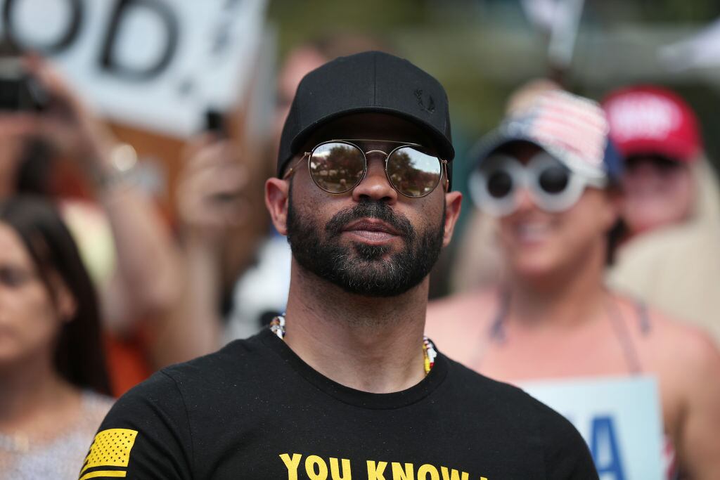 ORLANDO, FLORIDA - FEBRUARY 27: Enrique Tarrio, leader of the Proud Boys, stands outside of the Hyatt Regency where the Conservative Political Action Conference is being held on February 27, 2021 in Orlando, Florida. Begun in 1974, CPAC brings together conservative organizations, activists, and world leaders to discuss issues important to them.  (Photo by Joe Raedle/Getty Images)