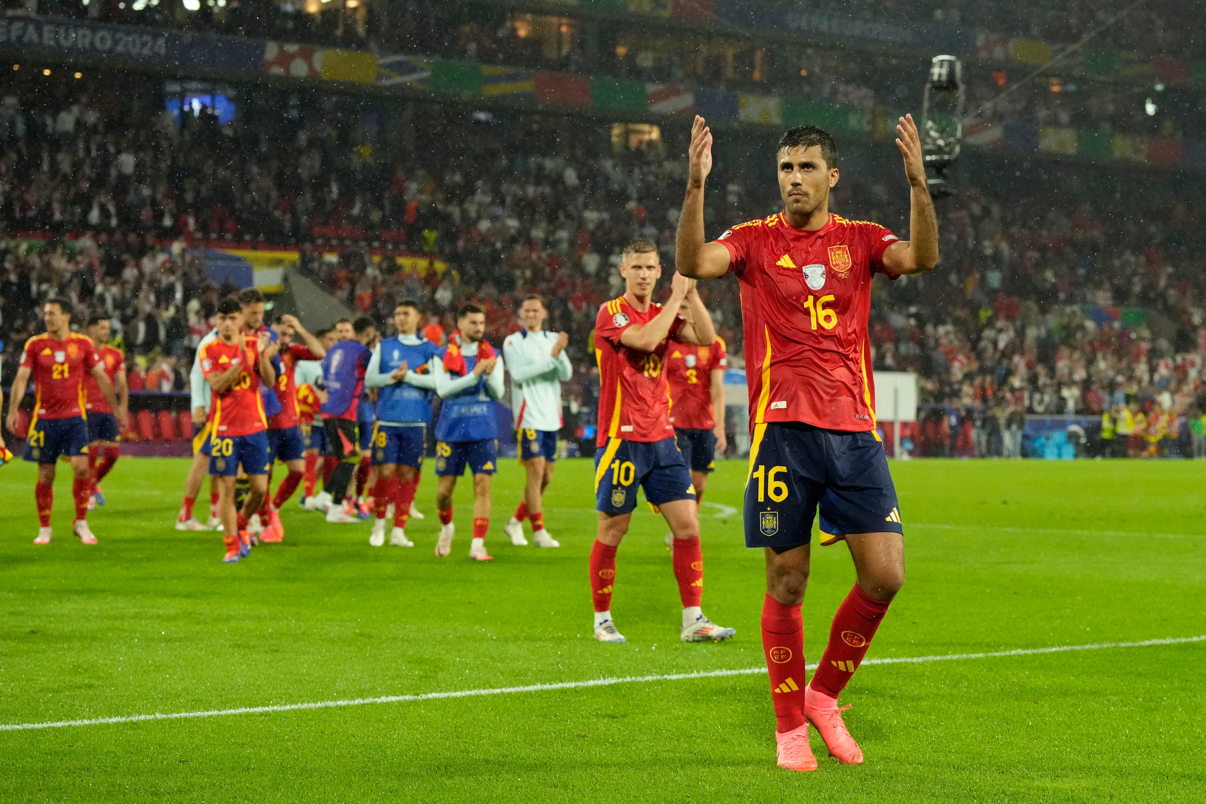 Spain's players react at the end of a round of sixteen match at the Euro 2024 soccer tournament against Georgia in Cologne, Germany, Sunday, June 30, 2024. Spain won the game 4-1. AP Photo/Frank Augstein)