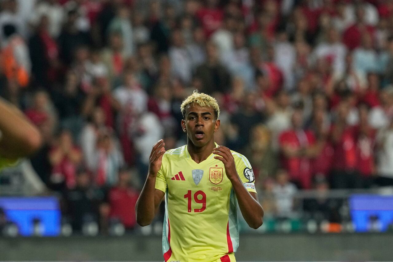 Spain's Lamine Yamal reacts after missing a chance to score during a World Cup qualifying round Group E soccer match between Turkey and Spain at Konya Buyuksehir stadium, in Konya, Turkey, Sunday, Sept. 7, 2025. (AP Photo/Khalil Hamra)
