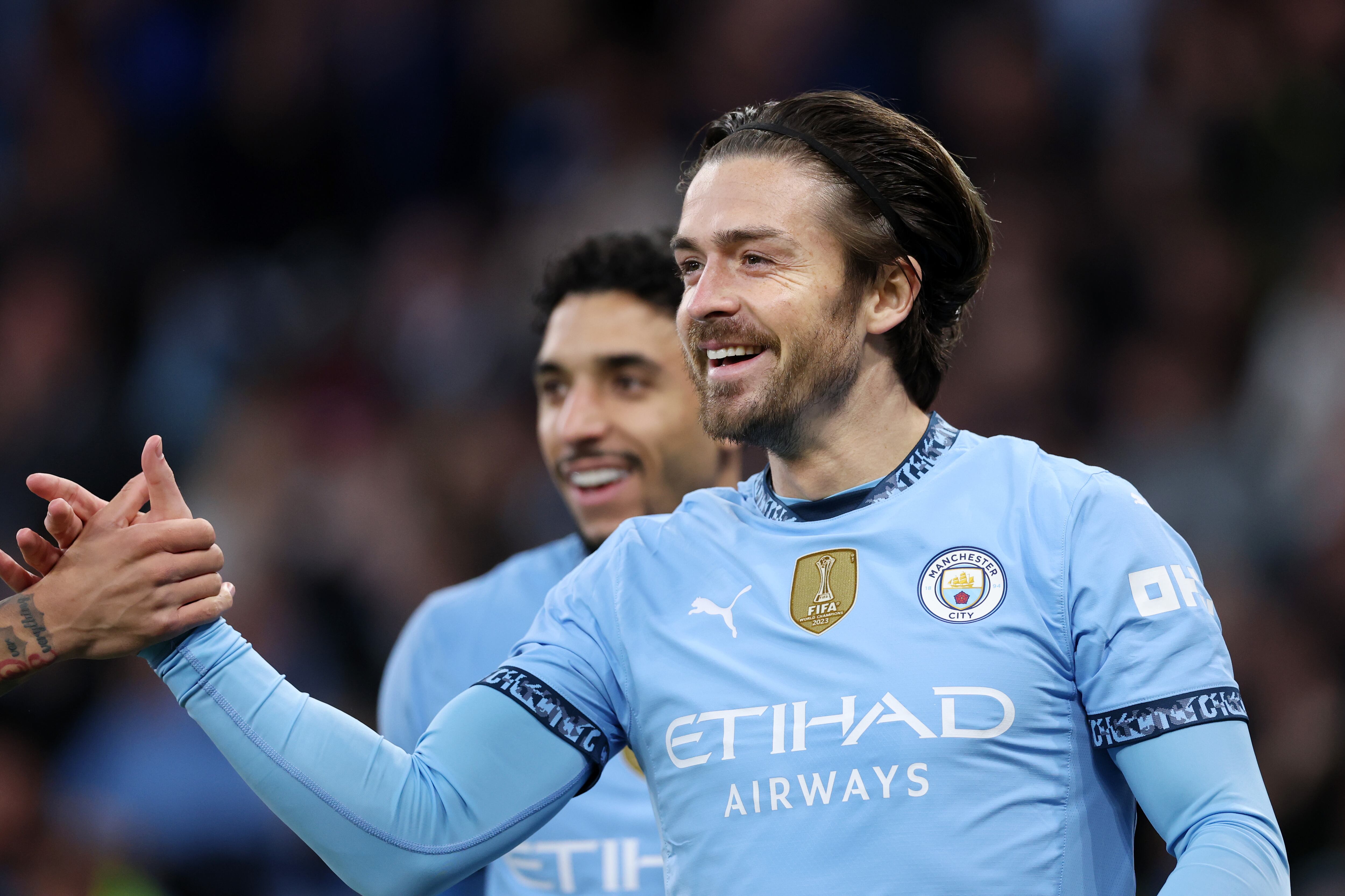 MANCHESTER, ENGLAND - APRIL 02: Jack Grealish of Manchester City celebrates scoring his team's first goal during the Premier League match between Manchester City FC and Leicester City FC at Etihad Stadium on April 02, 2025 in Manchester, England. (Photo by Michael Steele/Getty Images)