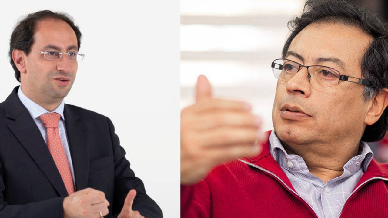 El ministro José Manuel Restrepo y el senador Gustavo Petro