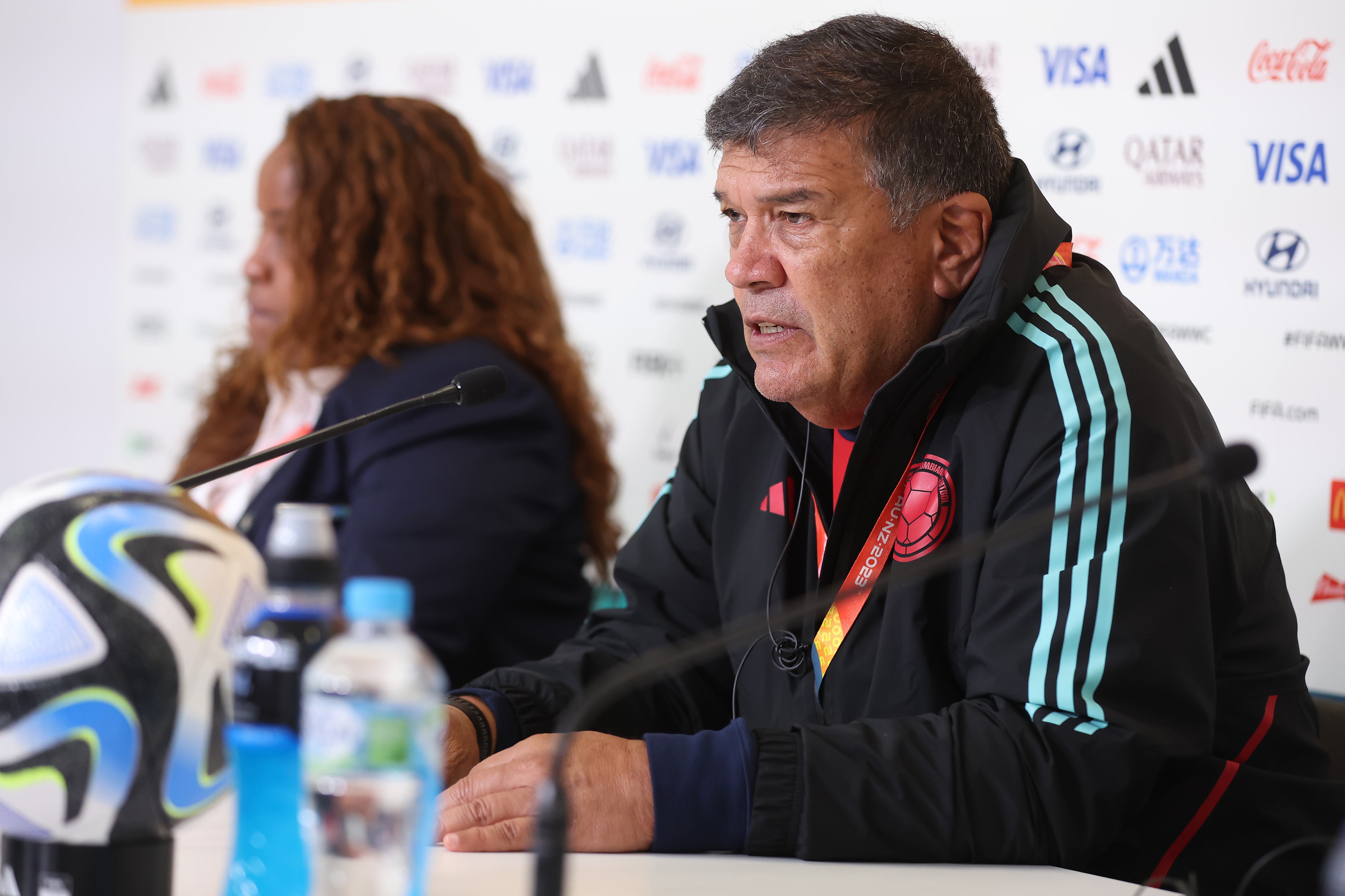MELBOURNE, AUSTRALIA - AUGUST 08: Nelson Abadia, Head Coach of Colombia, speaks to the media in the post match press conference following the FIFA Women's World Cup Australia & New Zealand 2023 Round of 16 match between Colombia and Jamaica at Melbourne Rectangular Stadium on August 08, 2023 in Melbourne / Naarm, Australia. (Photo by Alex Grimm - FIFA/FIFA via Getty Images)