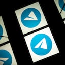 (FILES) This picture taken on October 5, 2020 shows the logo of mobile messaging and call service telegram on a tablet screen in Toulouse, southwestern France. Messaging app Telegram calls it an "attack on democracy," Google says it "seriously threatens free speech" -- but what exactly is in Brazil's controversial measure to regulate disinformation online? The bill aims to increase internet companies' transparency and make them adopt rules to combat illegal content in seven areas: attacks against democracy and the rule of law, children, the health system, and women; racism; terrorism; and incitement to suicide or self-harm. (Photo by Lionel BONAVENTURE / AFP)