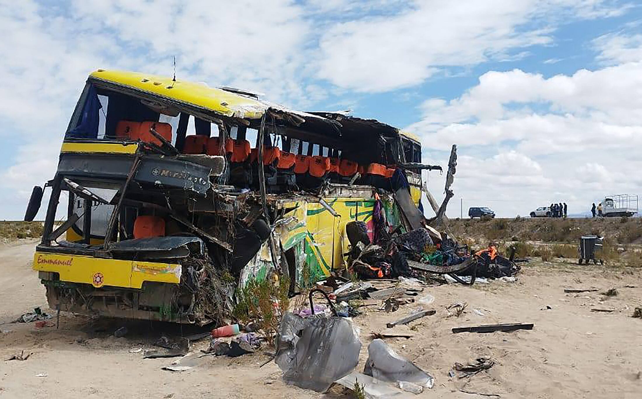 Handout picture released by Bolivian Police shows the wreckage of a bus that collided with another one on a highway near Uyuni, Bolivia on March 1, 2025. Two passenger buses collided in the early hours of March 1, 2025, on a highway in southern Bolivia, leaving at least 37 dead, including two children, and some 30 people injured, police said. (Photo by Handout / Bolivian Police / AFP) / RESTRICTED TO EDITORIAL USE - MANDATORY CREDIT "AFP PHOTO / Bolivian Police / HANDOUT /  " - NO MARKETING NO ADVERTISING CAMPAIGNS - DISTRIBUTED AS A SERVICE TO CLIENTS