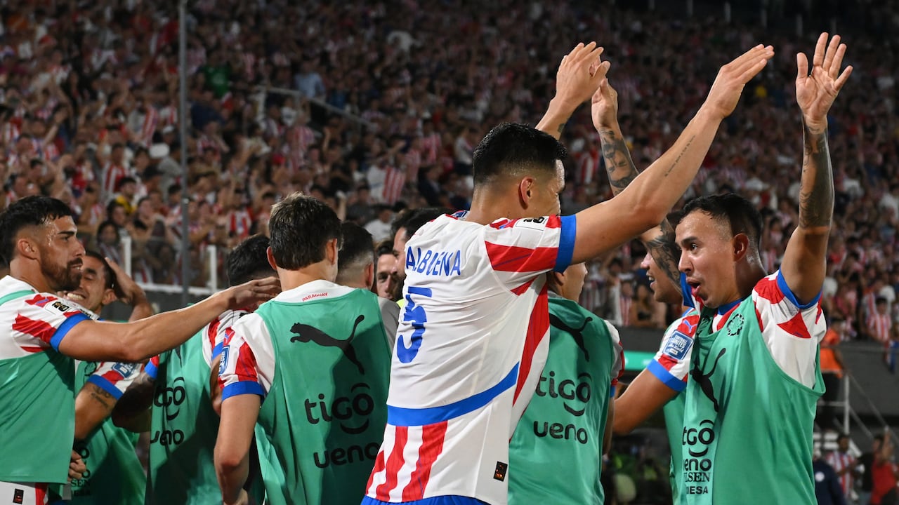ASUNCION, PARAGUAY - MARCH 20: Omar Alderete of Paraguay (hidden) celebrates with teammates after scoring the team's first goal during the South American FIFA World Cup 2026 Qualifier match between Paraguay and Chile at Estadio Defensores del Chaco on March 20, 2025 in Asuncion, Paraguay. (Photo by Christian Alvarenga/Getty Images)