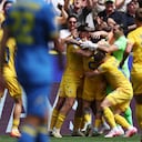 Rumania celebrando ante Ucrania por la Eurocopa 2024