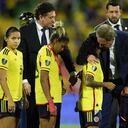 Colombia's players line up to receive the second place medal during the award ceremony of the women's Copa America soccer tournament in Bucaramanga, Colombia , Saturday, July 30, 2022. Colombia lost to Brazil 0-1. (AP Photo/Fernando Vergara)
