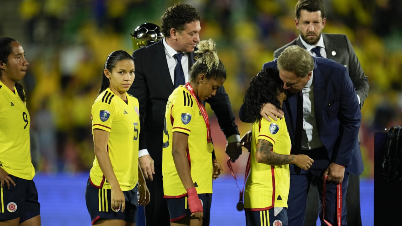 Colombia's players line up to receive the second place medal during the award ceremony of the women's Copa America soccer tournament in Bucaramanga, Colombia , Saturday, July 30, 2022. Colombia lost to Brazil 0-1. (AP Photo/Fernando Vergara)