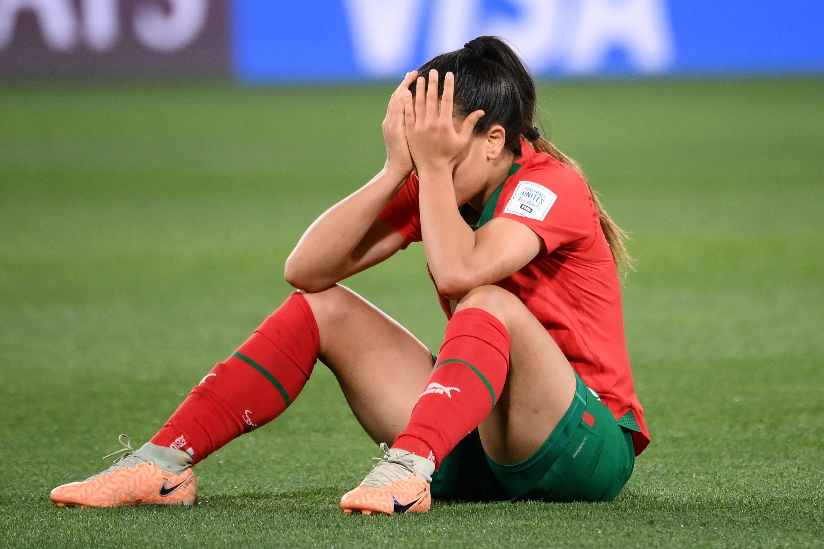 Morocco's forward #19 Sakina Diki reacts at the end of the Australia and New Zealand 2023 Women's World Cup round of 16 football match between France and Morocco at Hindmarsh Stadium in Adelaide on August 8, 2023. (Photo by FRANCK FIFE / AFP)