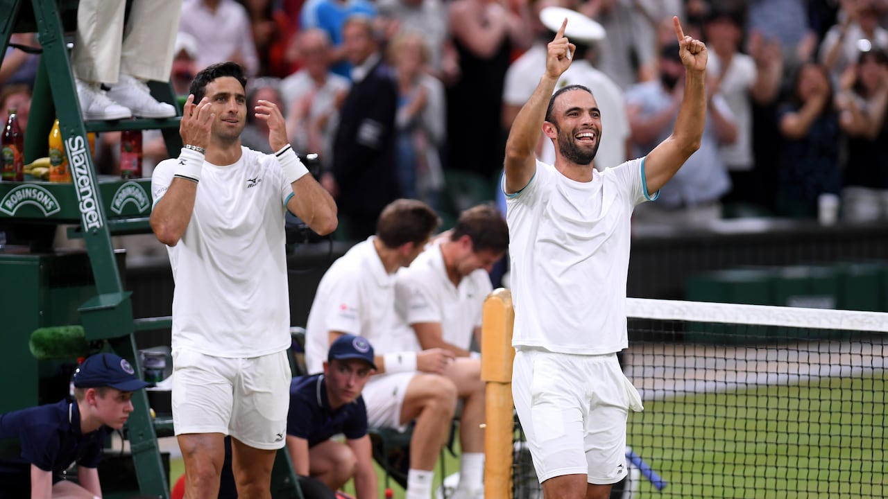 LONDON, ENGLAND - JULY 13: Sebastian Cabal of Colombia and playing partner Juan Robert Farah of Colombia celebrate victory in their Men's Doubles final against Nicolas Mahut of France and Edouard Roger-Vasselin of France during Day twelve of The Championships - Wimbledon 2019 at All England Lawn Tennis and Croquet Club on July 13, 2019 in London, England. (Photo by Laurence Griffiths/Getty Images)