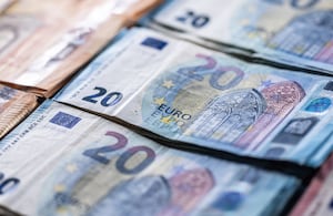 Euro currency. Banknotes stacked on each other in different positions.Several hundred euro banknotes stacked by value