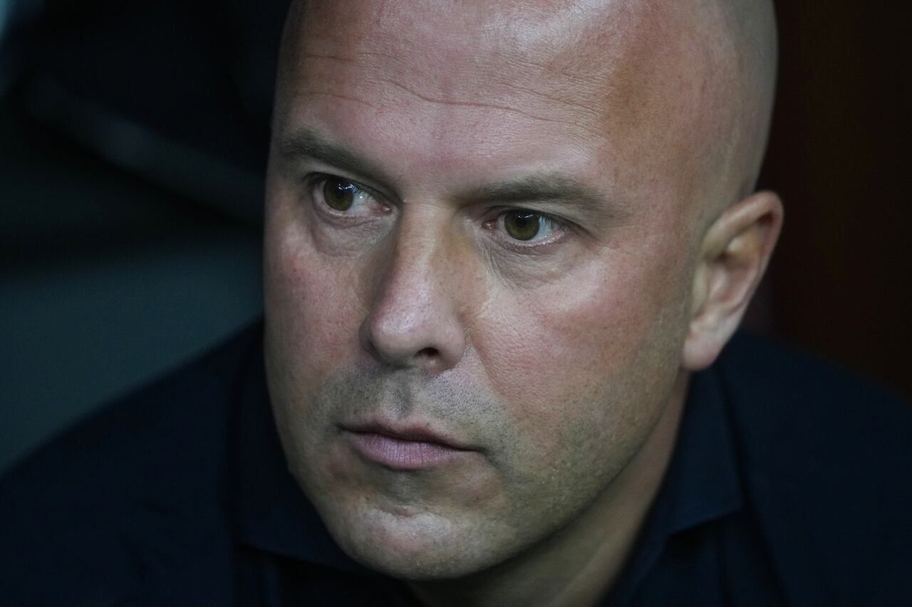 Liverpool's manager Arne Slot waits for the beginning of the Champions League opening phase soccer match between Galatasaray and Liverpool at the Ali Sami Yen stadium, in Istanbul, Turkey, Tuesday, Sept. 30, 2025. (AP Photo/Francisco Seco)