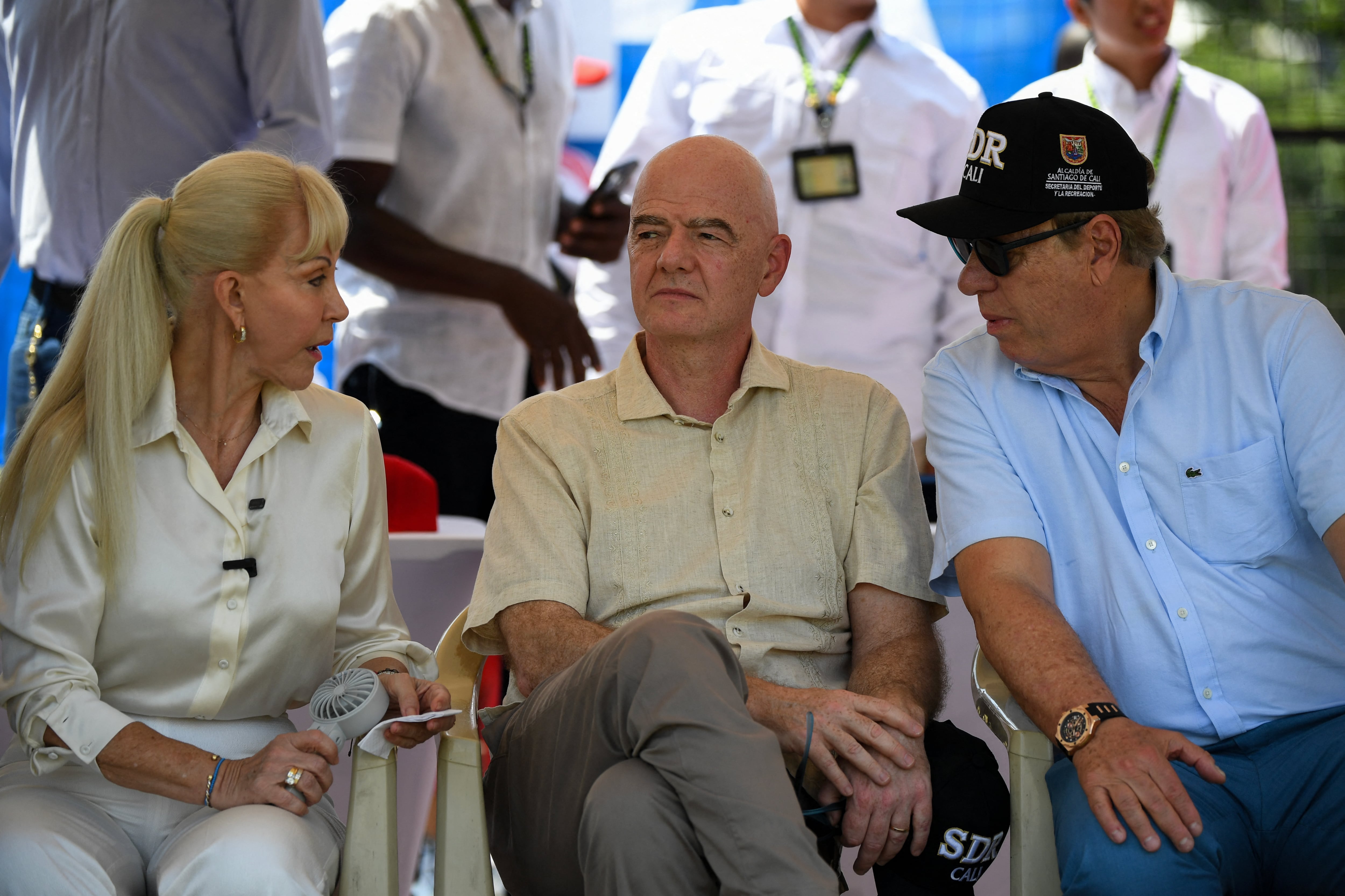 FIFA's president Gianni Infantino speaks with the governor of Valle del Cauca Dilian Francisca Toro (L) and the president of Colombia's Footbal Federation (FCF) Ramon Jesurun, during a visit to a sports complex in Cali, Colombia, on August 7, 2026. (Photo by Jaime SALDARRIAGA / AFP)