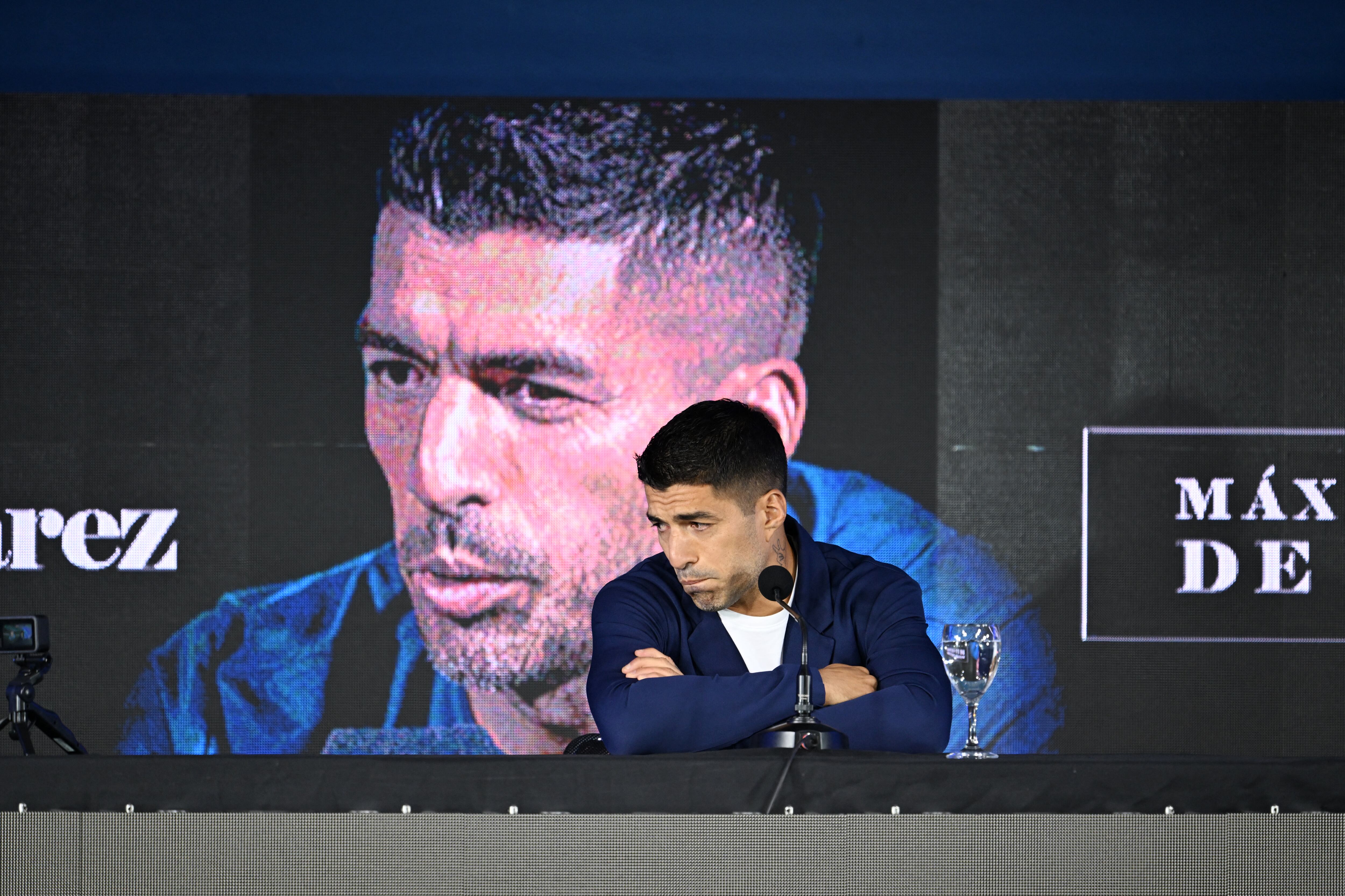 Uruguay's forward Luis Suarez gestures during a press conference at the Centenario Stadium in Montevideo on September 2, 2024. Luis Suarez, Uruguay's all-time leading scorer, announced that he will play his last game for La Celeste this Friday against Paraguay in Montevideo, on the seventh round of the South American qualifiers for the World Cup North America-2026. (Photo by Eitan ABRAMOVICH / AFP)