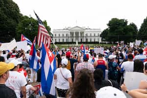 Demonstrators shout their solidarity with the Cuban people against the communist government during a rally outside the White House in Washington, Saturday, July 17, 2021.(AP Photo/Jose Luis Magana)